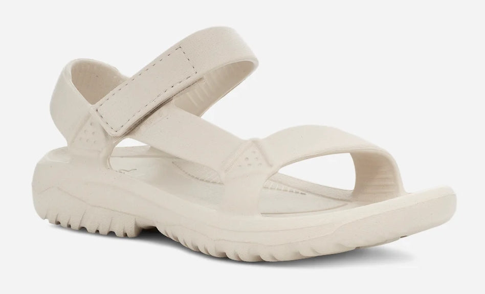 Womens lightweight open toe Hurricane Drift sandals from Teva in Birch Beige.
