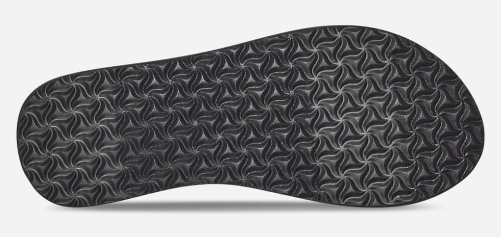 Women's Teva Black on Black Olowahu webbing strap sandals with outsole grips.