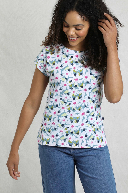 Model wearing a Weird Fish women's Paw Paw short sleeve t-shirt in Washed Blue and white floral daisy print.