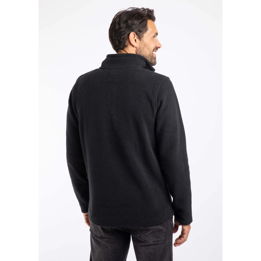 Man wearing a Weird Fish black ribbed fleece on a white background