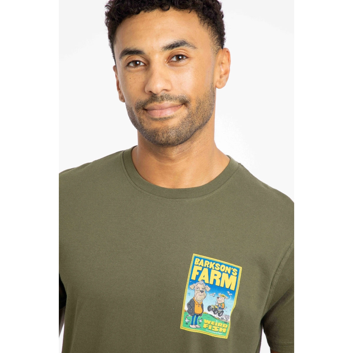 Weird Fish mens Barksons Farm tee green featuring cartoon farm graphic on chest