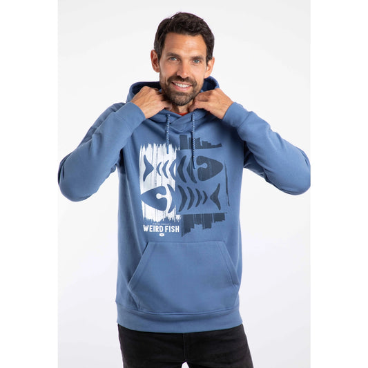 Front view of a man wearing a mid blue Bryant hoodie with a fish skeleton design and 'Weird Fish' branding on a white background