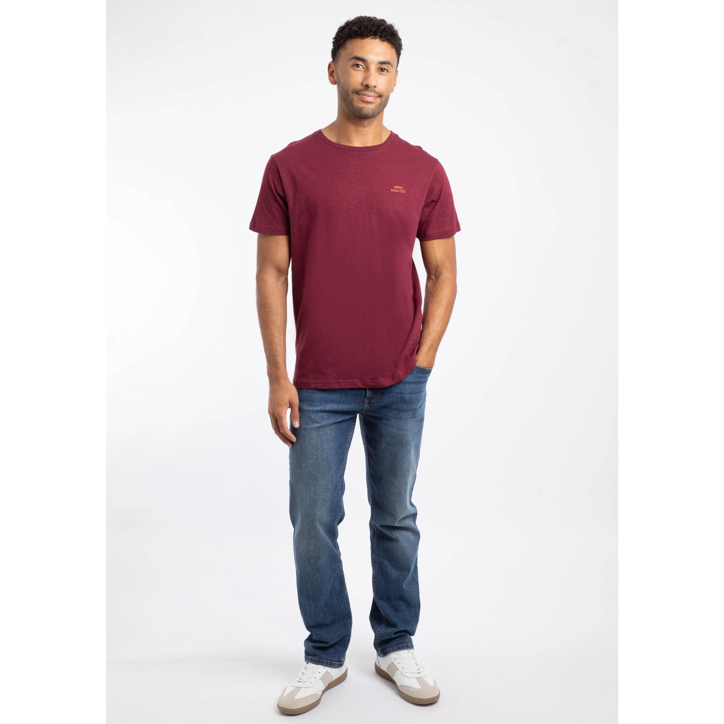 Weird Fish mens Fished t-shirt red worn by man with jeans and white sneakers in casual pose