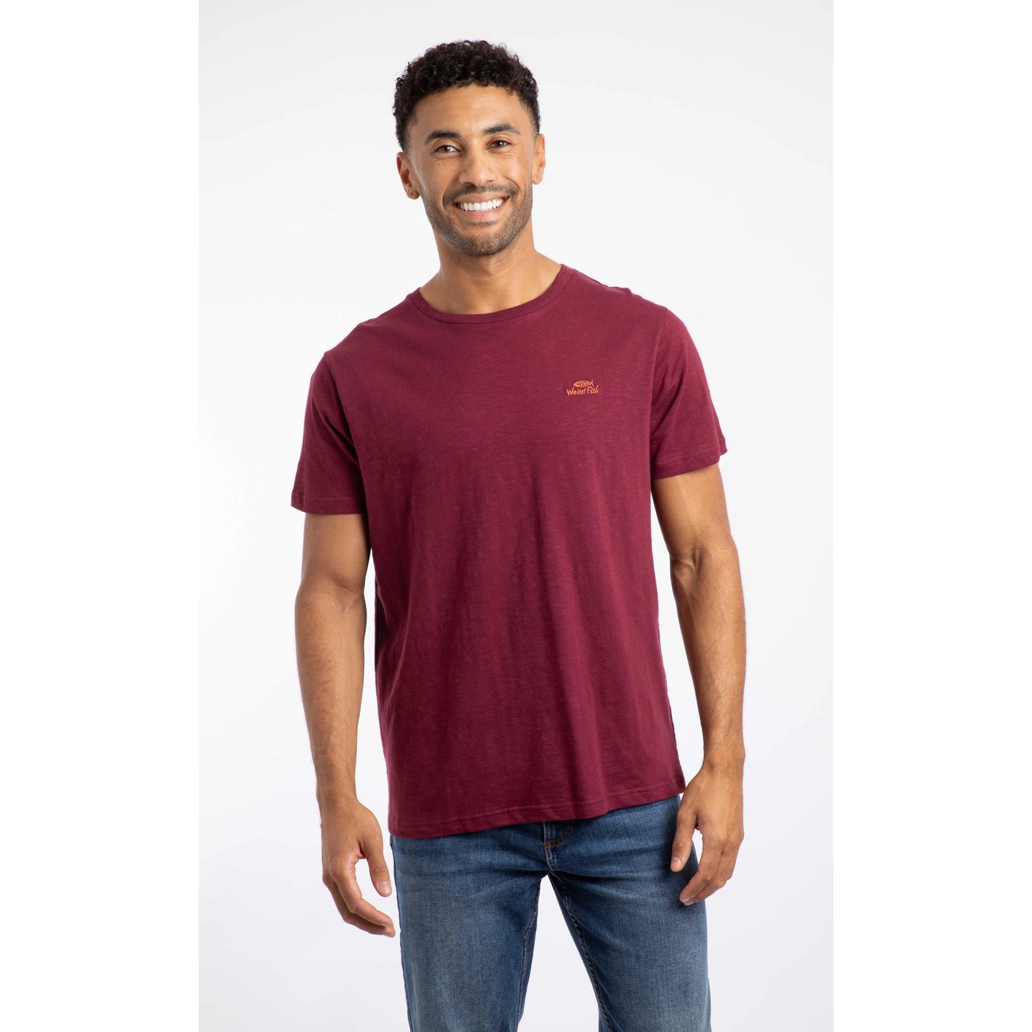 Weird Fish mens Fished t-shirt red worn by smiling man with short sleeves and small logo on chest