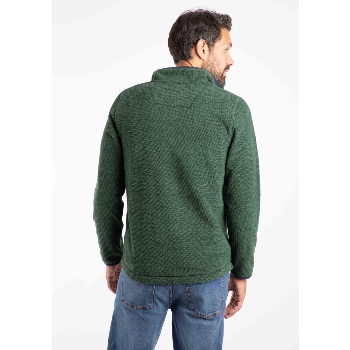 Man wearing a Weird Fish green Errill pullover fleece on a white background