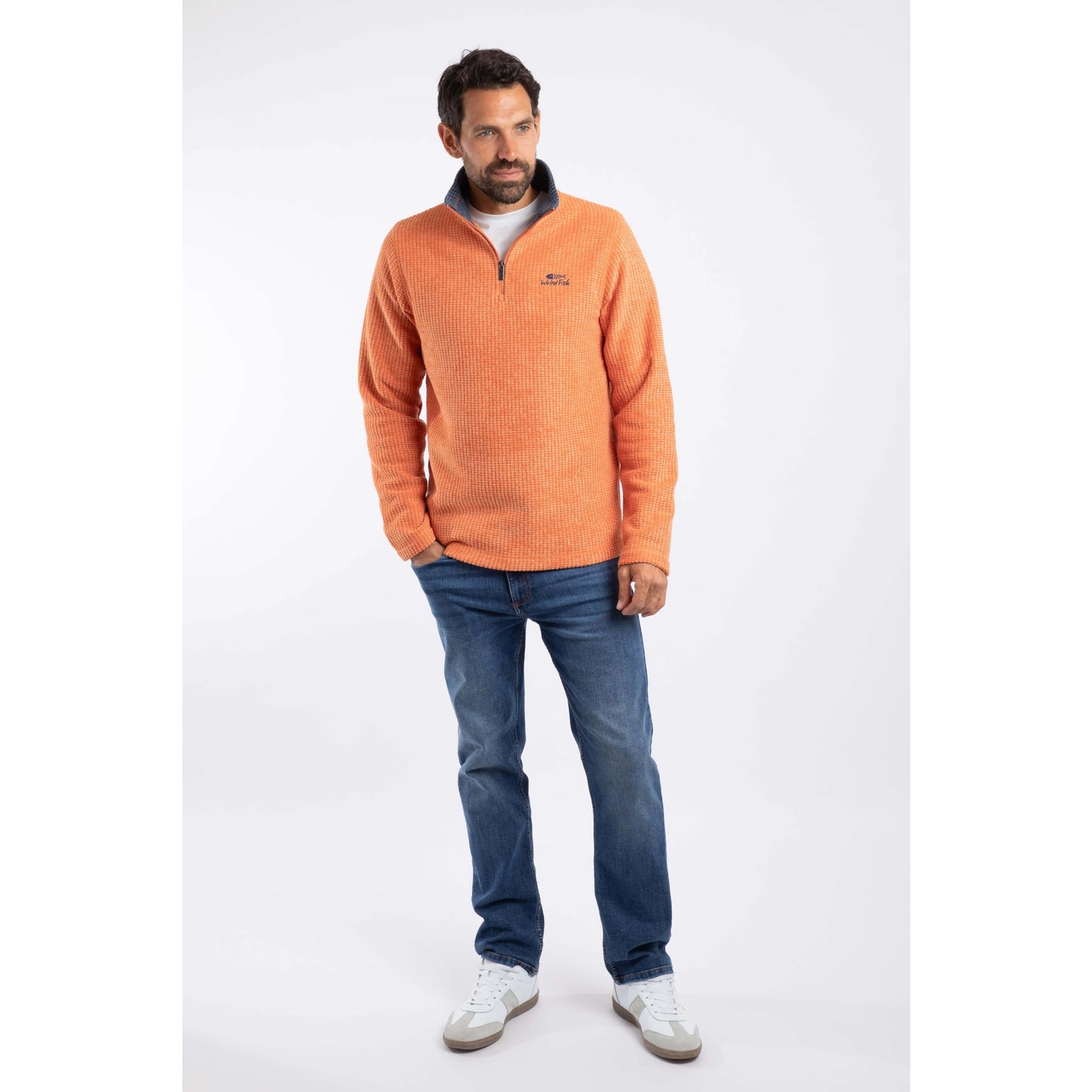 Weird Fish mens Newark grid fleece in Brick Orange worn by male model with half zip and long sleeves