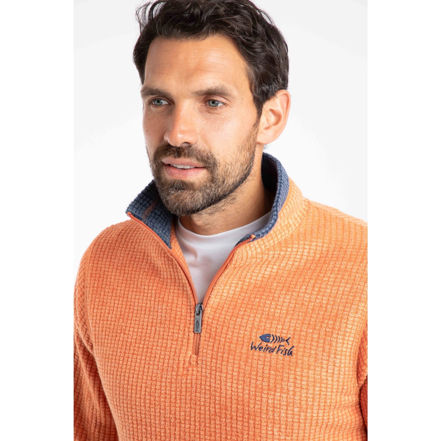 Weird Fish mens Newark grid fleece in Brick Orange quarter zip with textured pattern and logo on chest