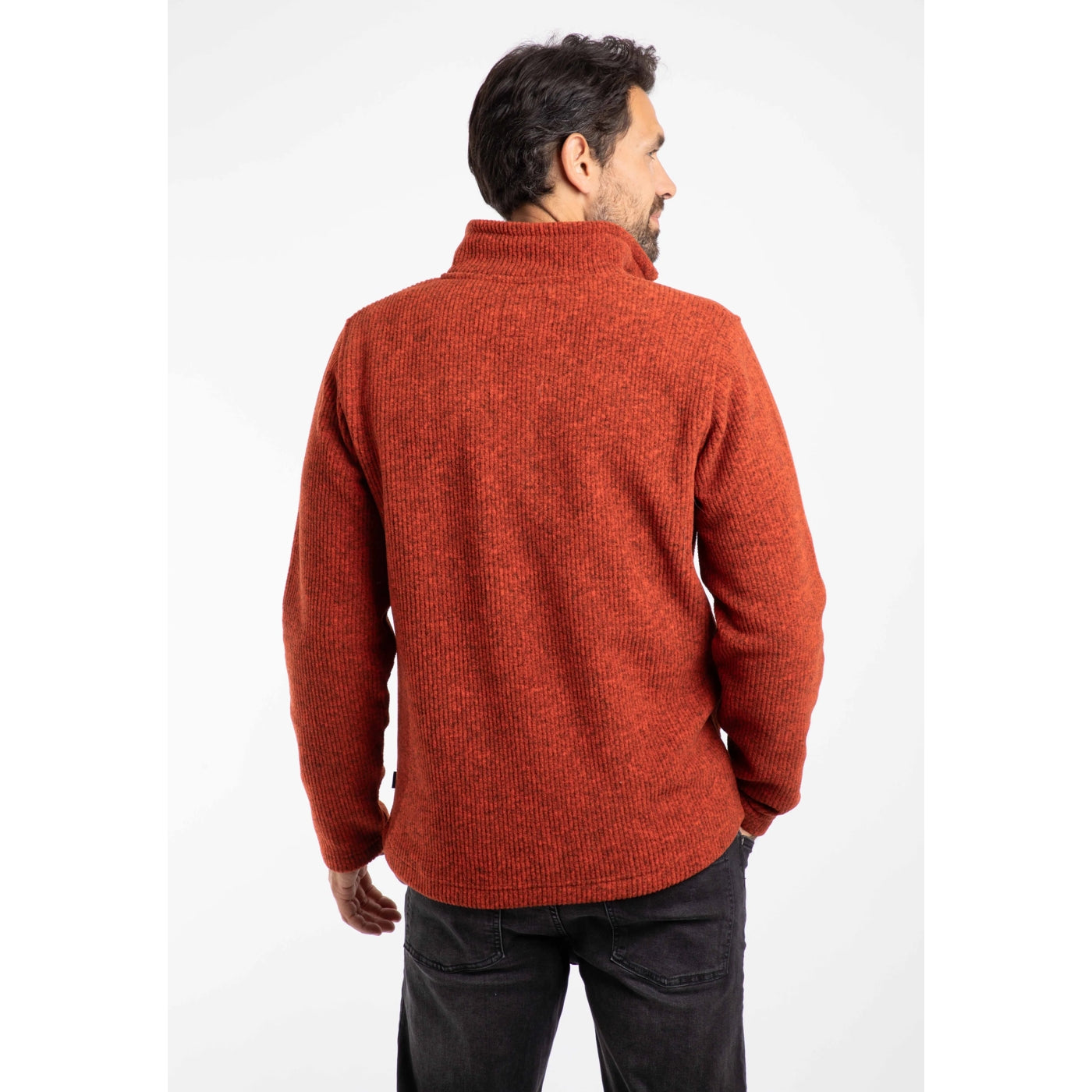 Man wearing a red Weird Fish Newport fleece on a white background