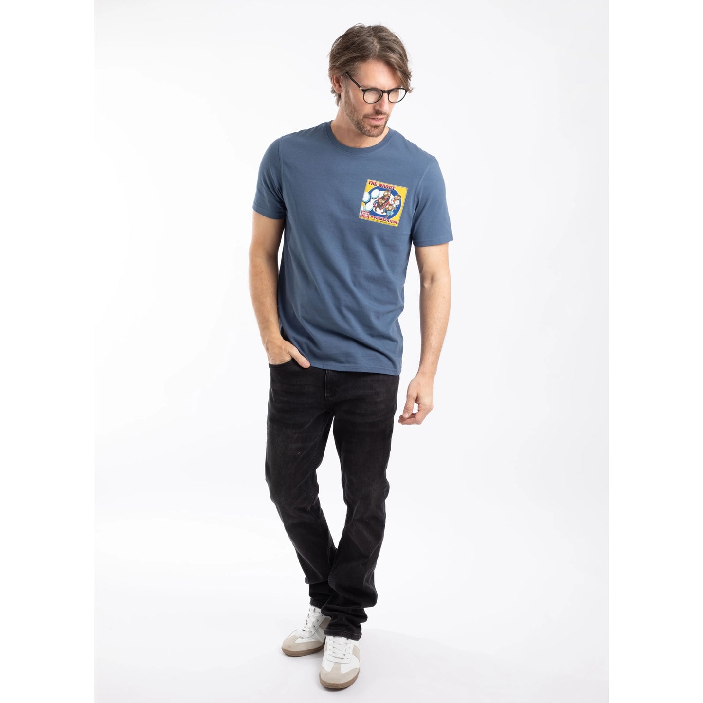 Man wearing a Weird Fish short sleeve The Whoot 'My Heneration' printed t-shirt in Ensign Blue with blue jeans and trainers
