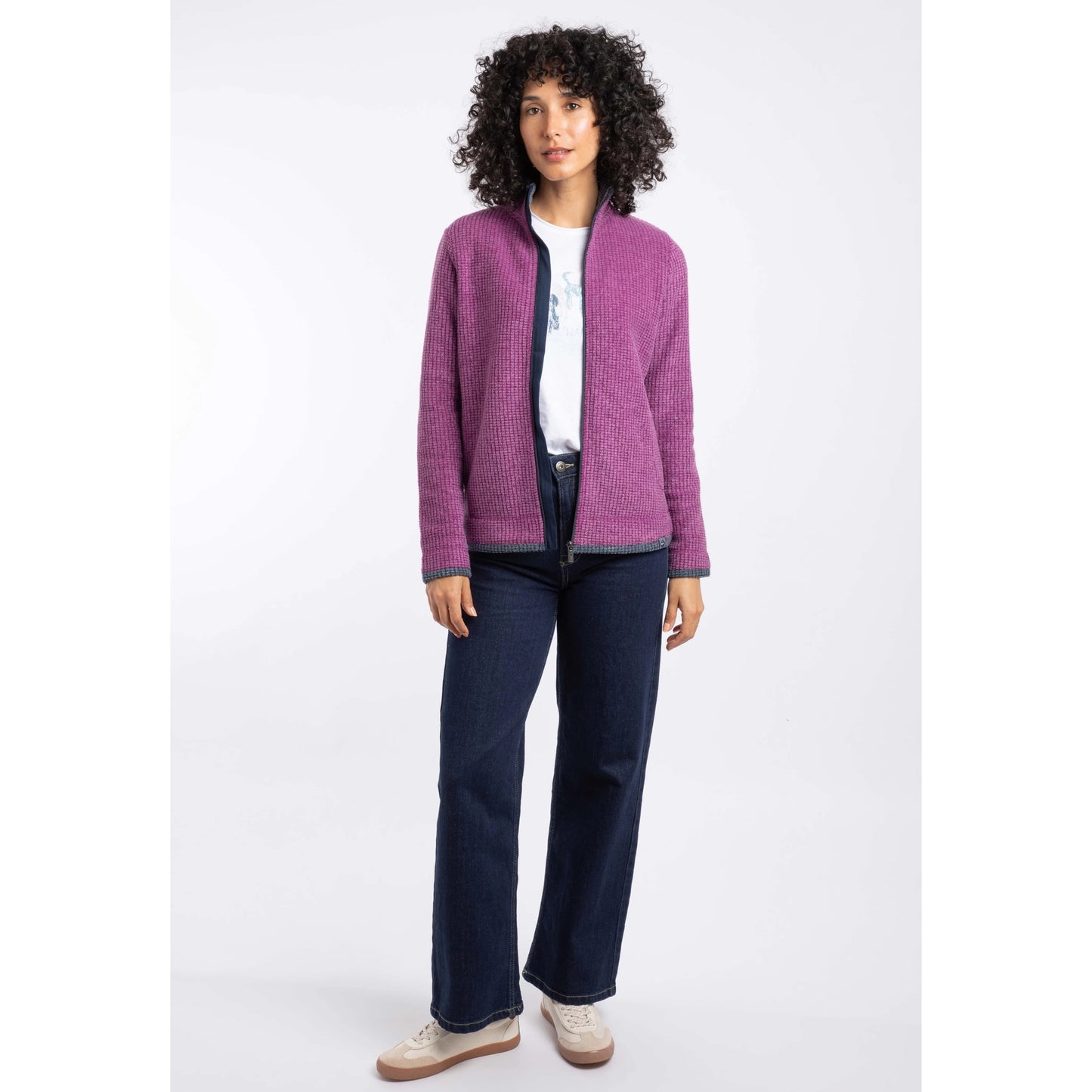 Weird Fish womens Ariana grid fleece purple wine cosy zip-up jacket on model with dark jeans