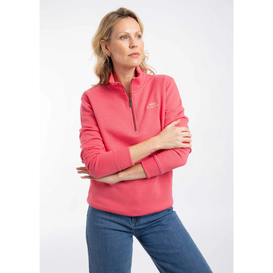 Front view of a woman wearing a Weird Fish Avery 1/4 zip plain sweatshirt in Flamingo Pink with a small logo on the chest