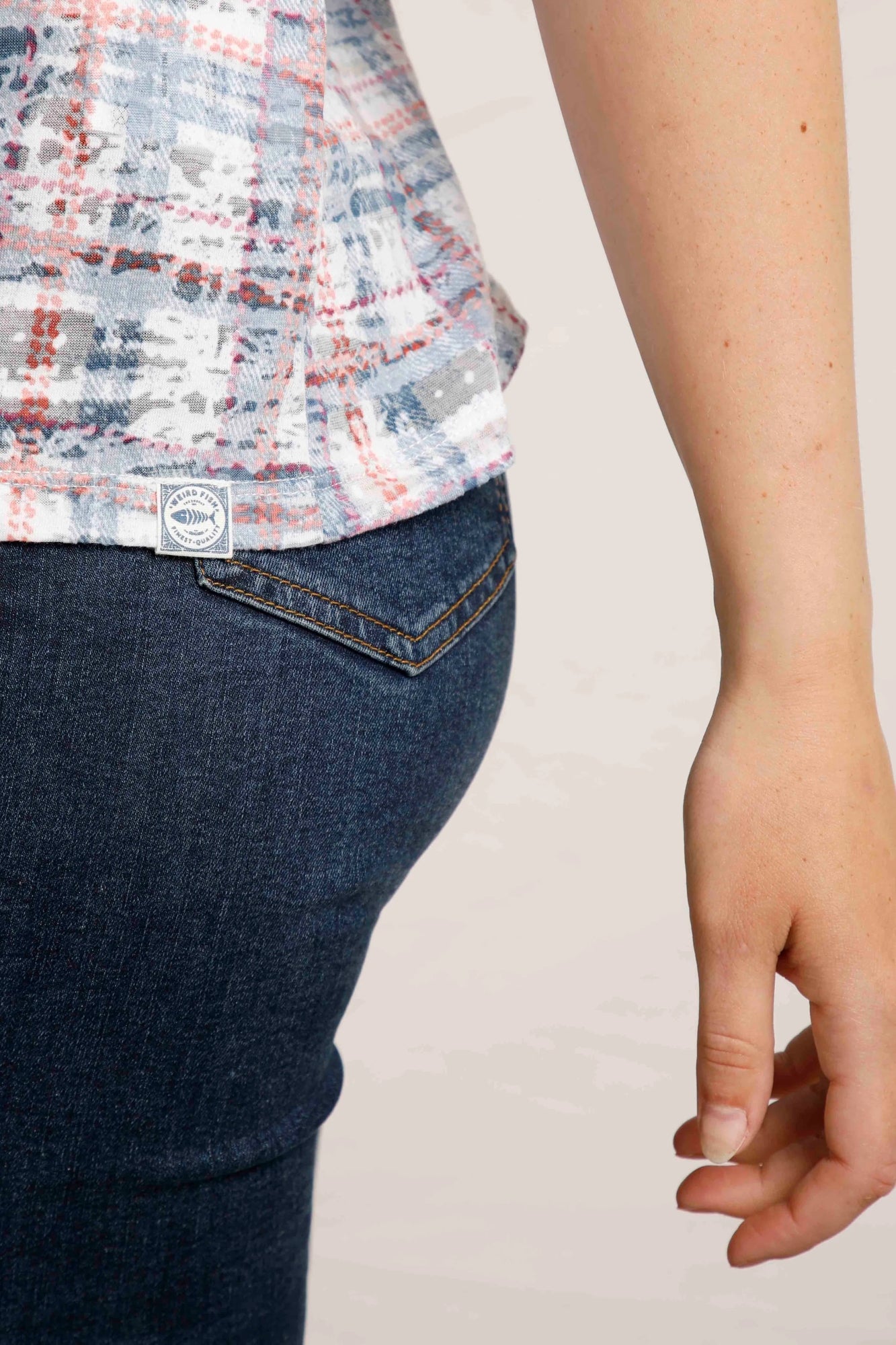 Weird Fish womens Fes check shirt in Pale Denim Blue hem detail paired with dark blue denim jeans