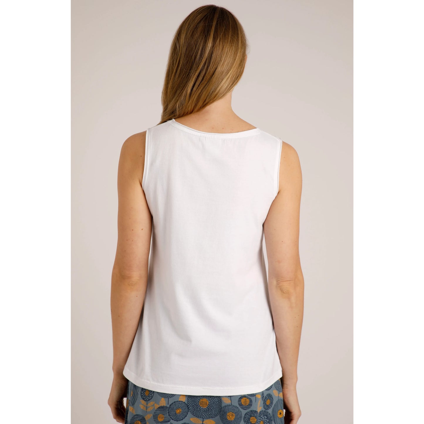 Back view of Weird Fish womens Calle plain white vest with sleeveless design and relaxed fit