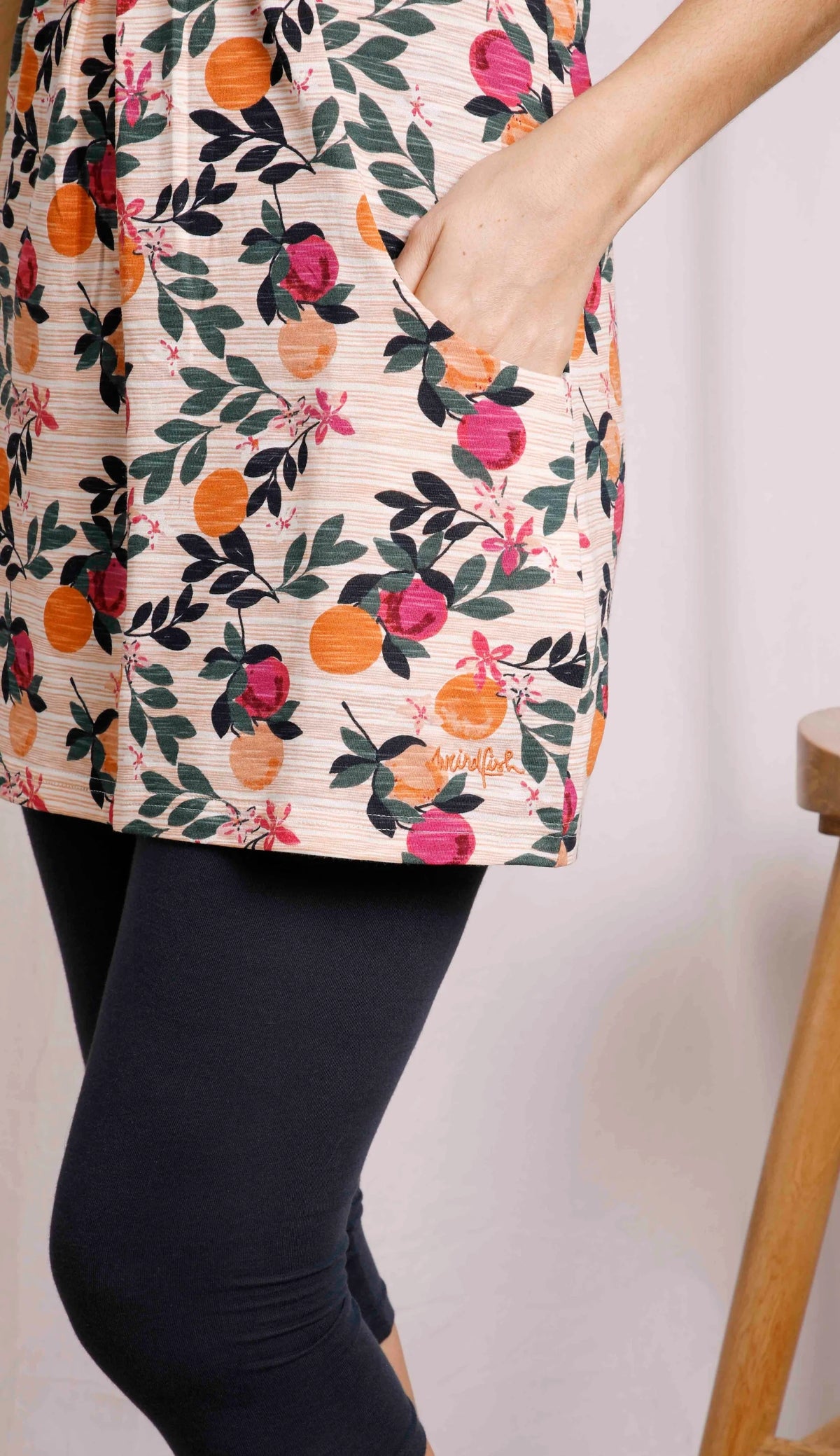 Weird Fish women's Indus jersey tunic in Cantaloupe print with front pockets.