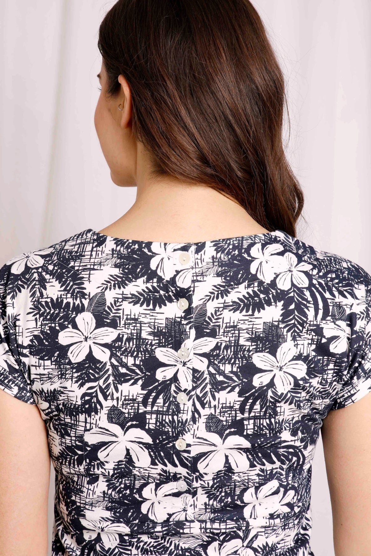 Weird Fish women's Tallhassee ccotton jersey dress in Dark Denim Blue with a White floral pattern with buttons down the back.