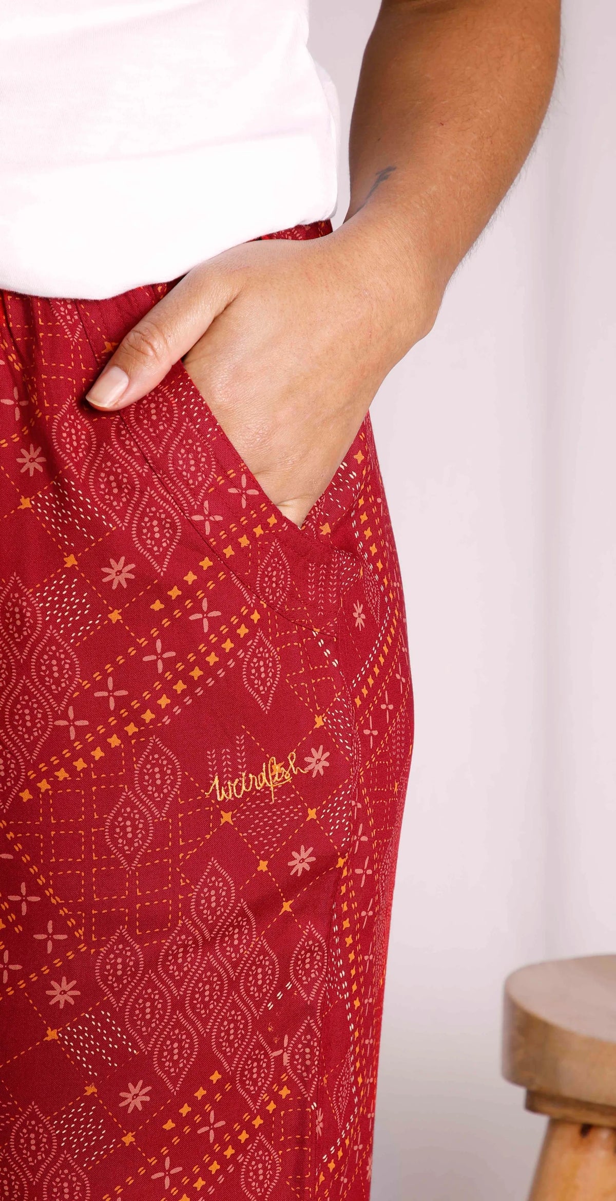 Weird Fish women's Chilli Red Tinto viscose trousers with hip pockets.