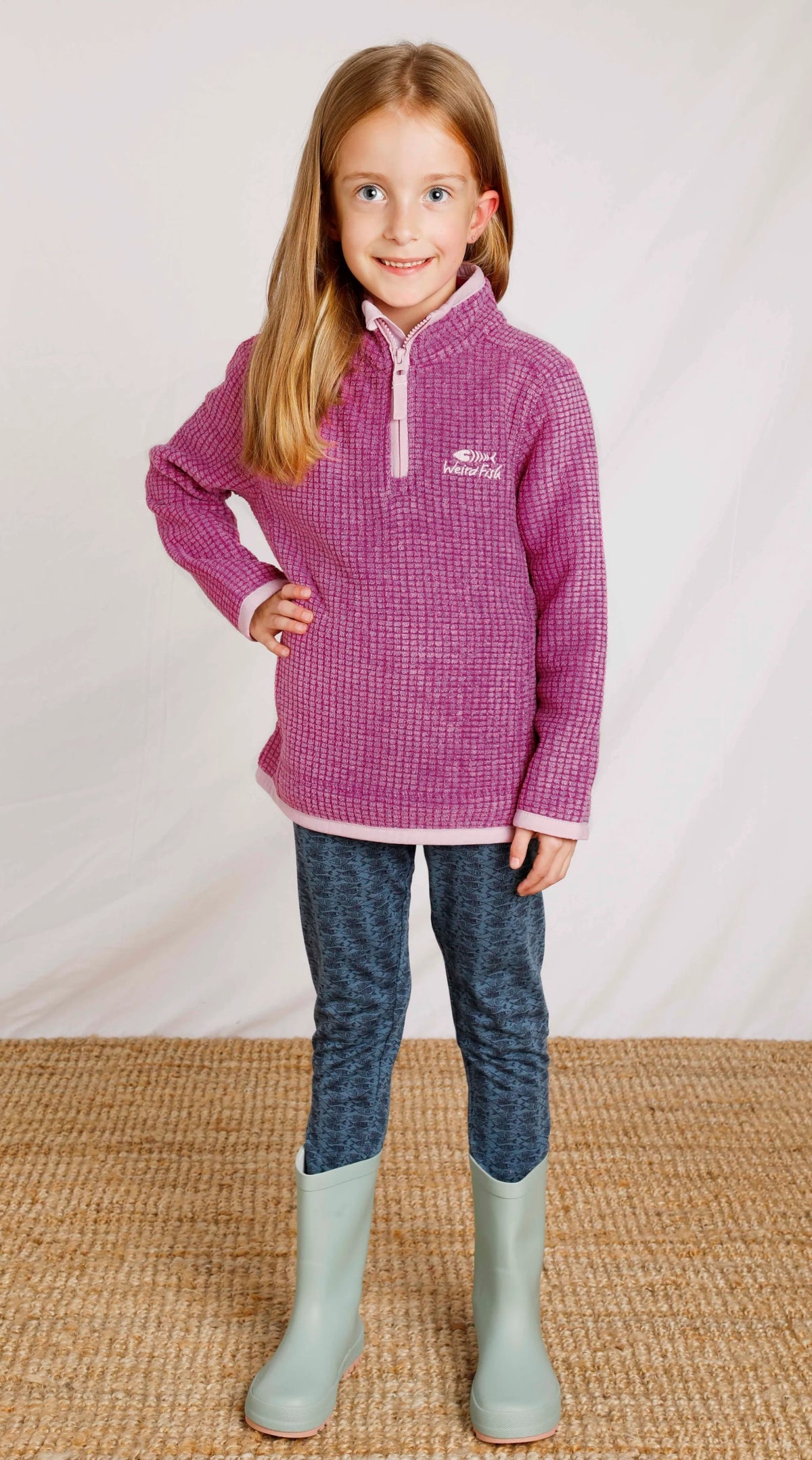 Kids Weird Fish Archie 1/4 zip grid fleece in Raspberry with contrasting pale pink trim.