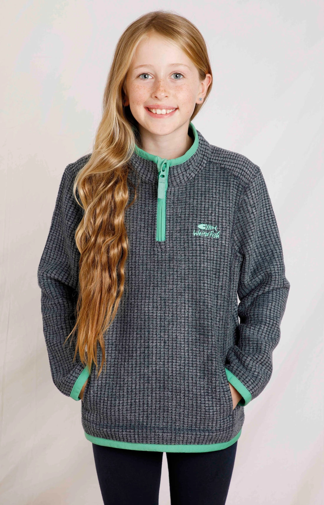 Weird Fish kids Archie Navy 1/4 zip grid fleece with tummy pockets.