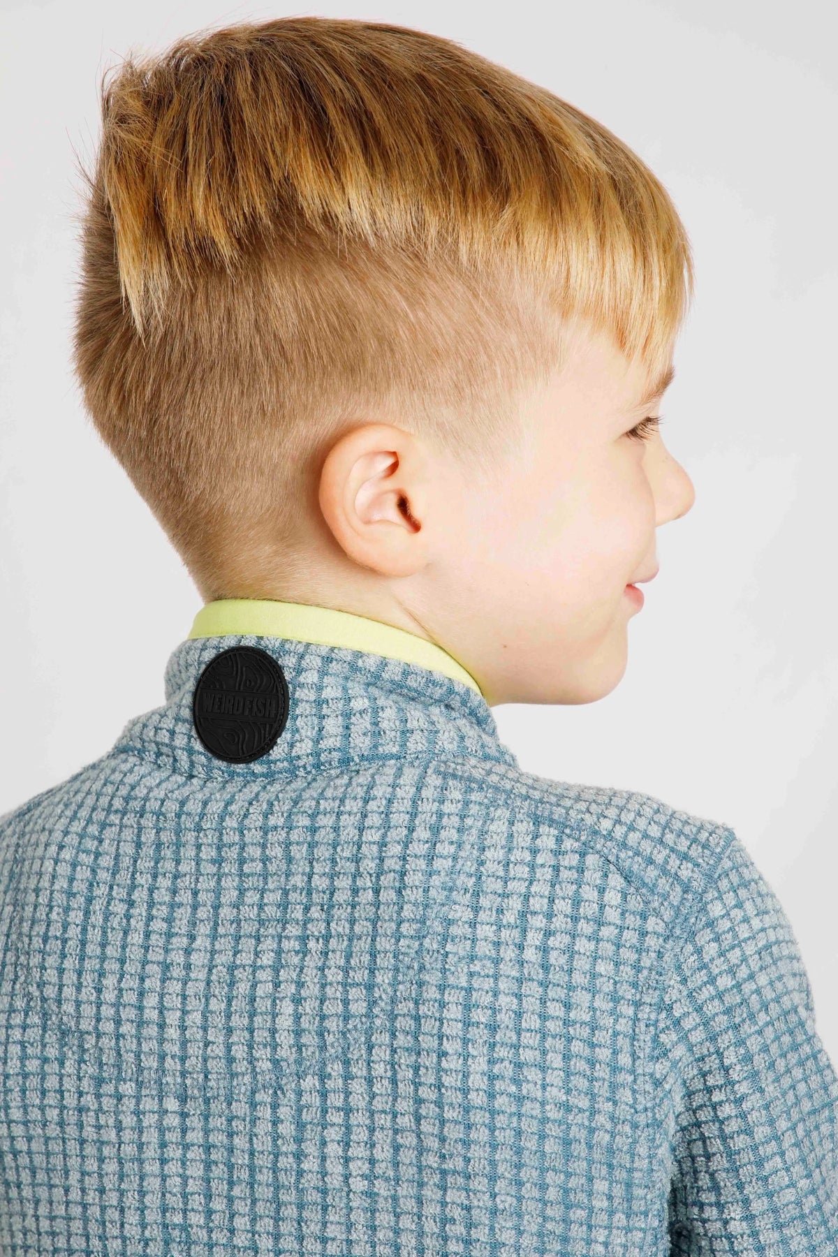 Uniform Blue Weird Fish kids Archie fleece with back of the neck logo patch.