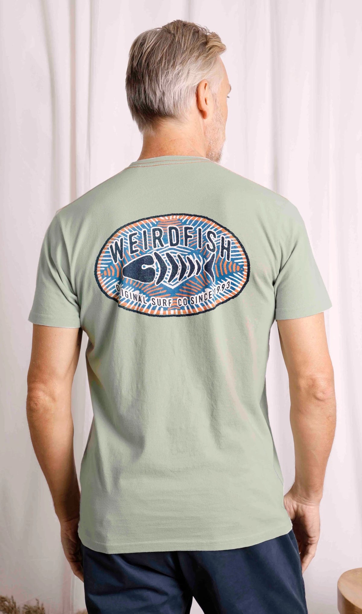 Pistachio Green crew neck Original surf print t-shirt for men from Weird Fish.