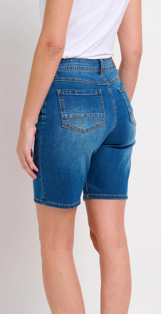 Brakeburn womens blue denim shorts with back pockets and fitted waist worn by model