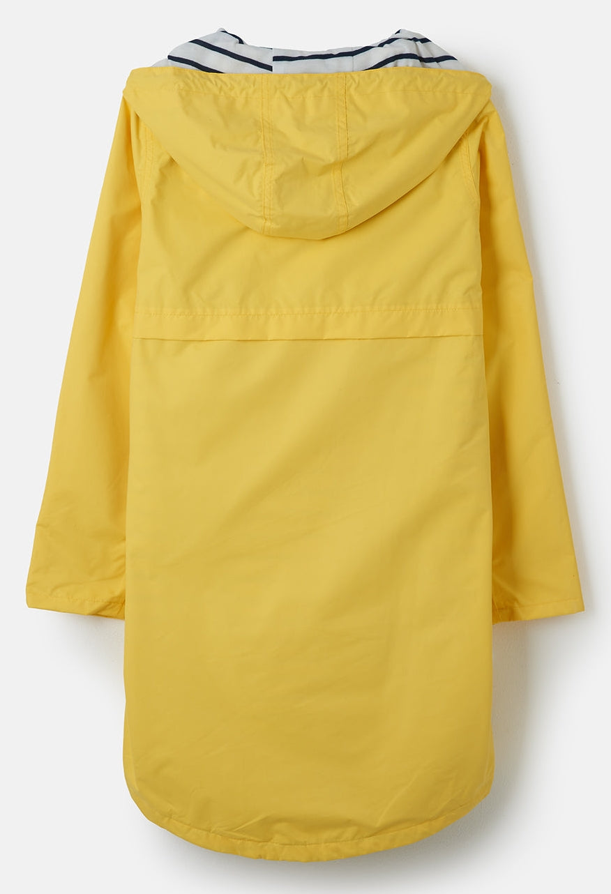 Back view of Lighthouse yellow waterproof jacket womens with hood and striped lining