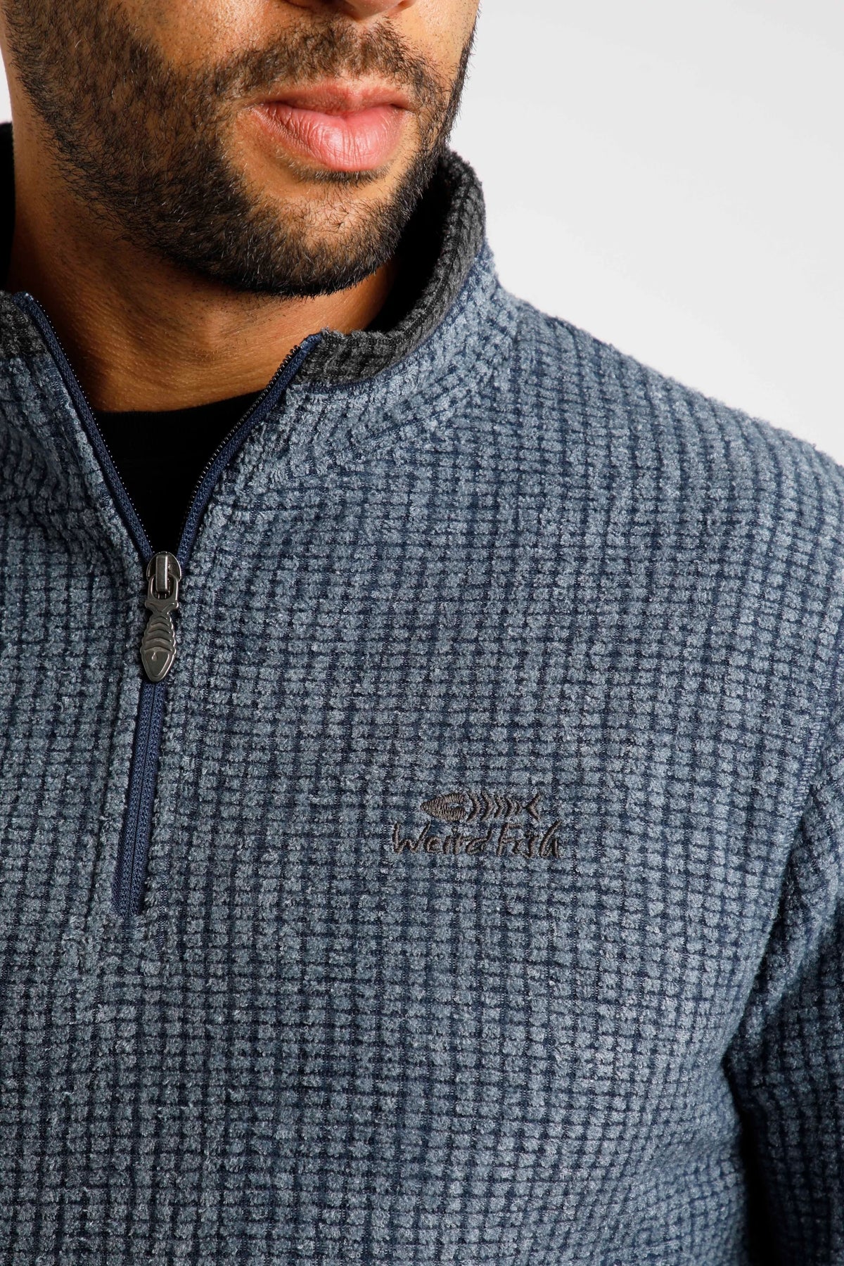 Weird Fish Newark fleece in blue with a quarter zip and embroidered logo for casual comfort