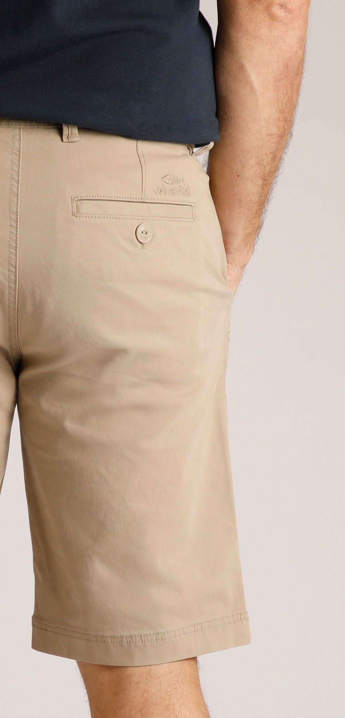 Back view of Weird Fish Rayburn mens chino shorts Taupe Grey with buttoned pocket detail