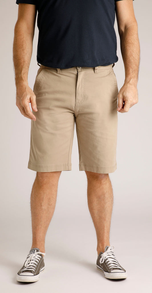 Front view of Weird Fish mens Rayburn chino shorts Taupe Grey worn by man with black shirt and grey sneakers