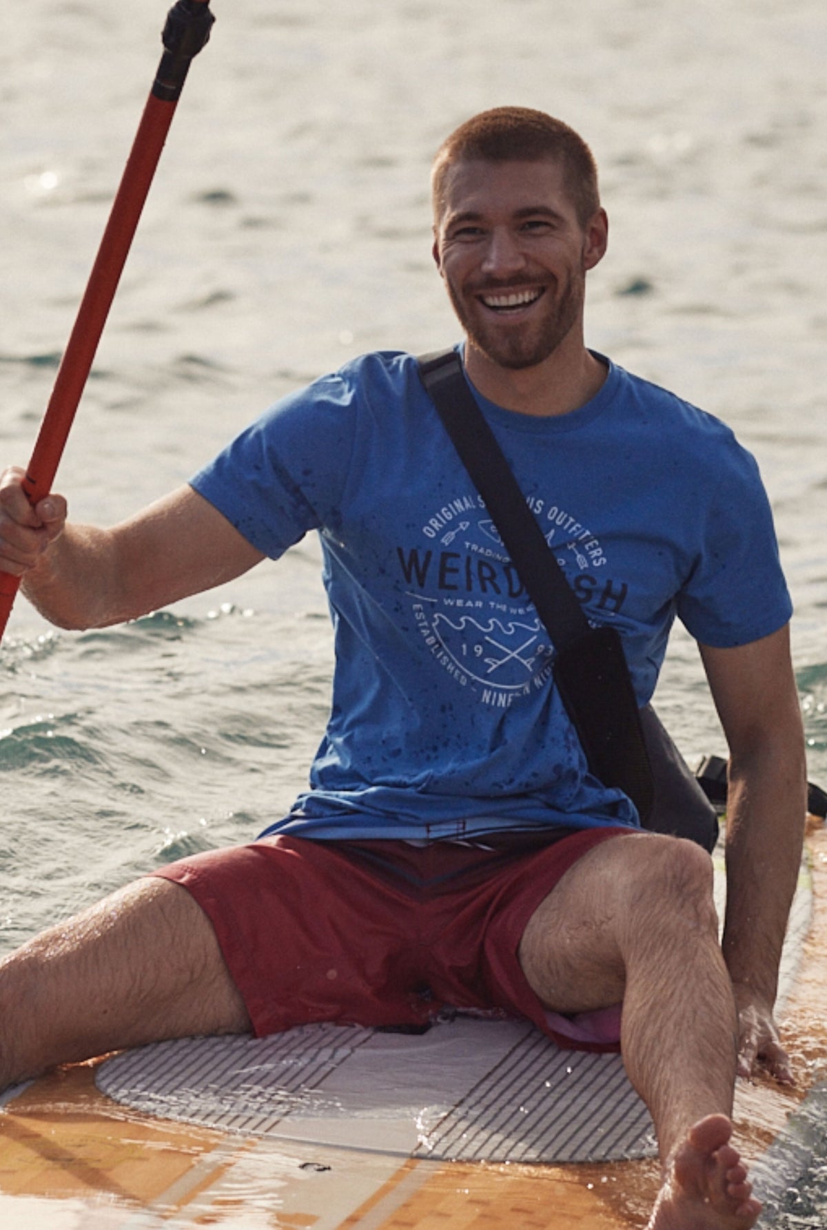 Weird Fish mens t-shirt in blue with a graphic design, perfect for outdoor water activities