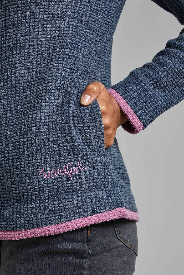 Weird Fish women's navy fleece with textured fabric and pink trim accents