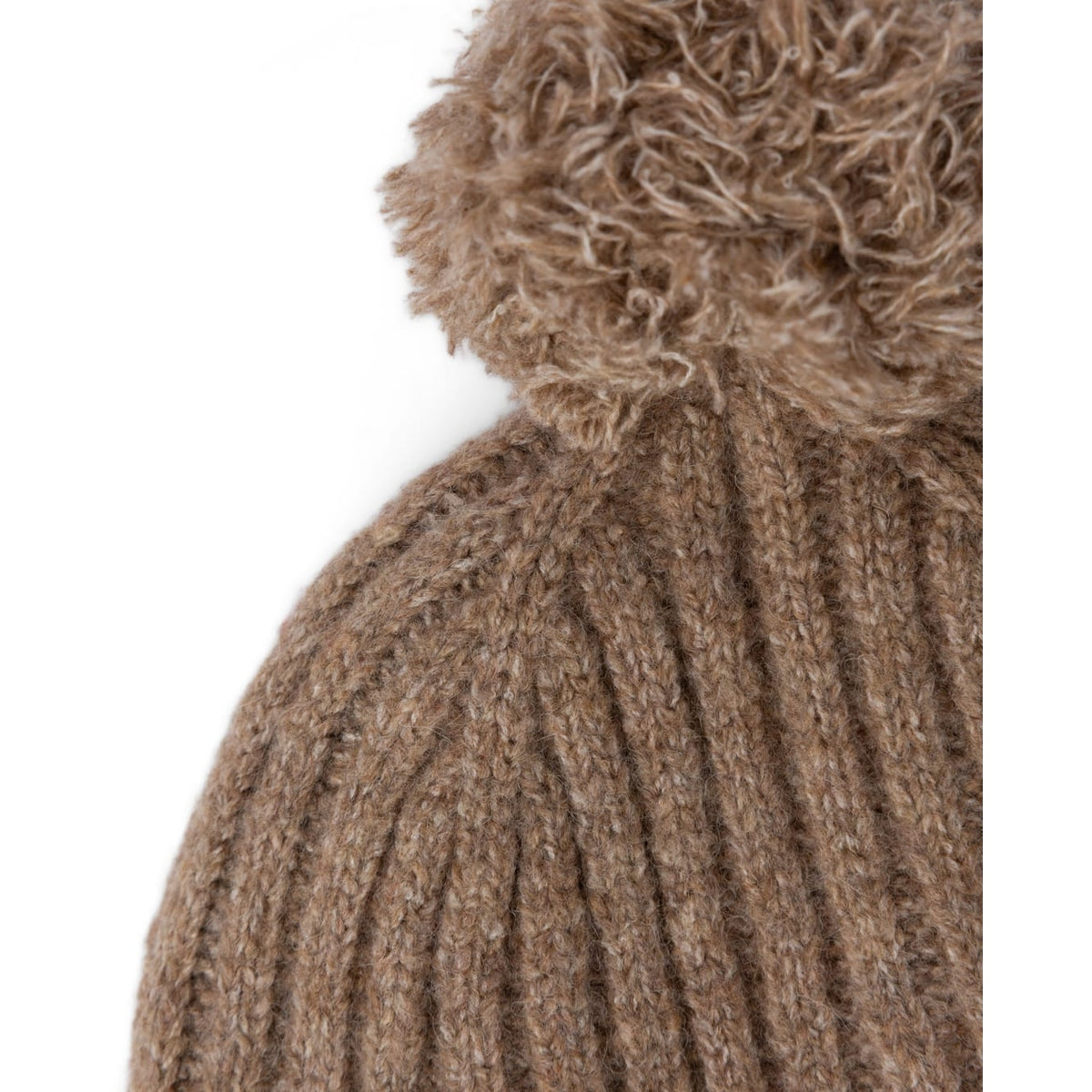 Close-up view of the bobble and ribbed knit of a Saltrock adults Legacy beanie in brown.