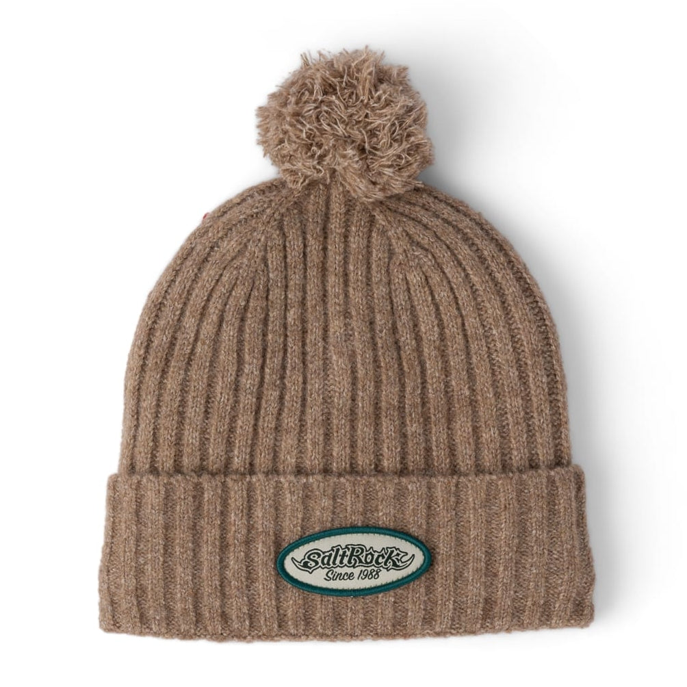 Front view of a Saltrock adults Legacy ribbed knit beanie with a turn back hem with logo patch and a bobble on top.