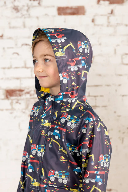 Side image of a boy wearing the coat with the hood up  