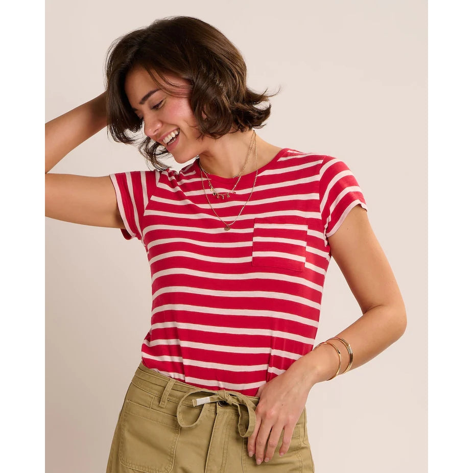 Front view of a woman wearing a Brakeburn red and white stripe Coastline short sleeve t-shirt with a pocket on the chest.