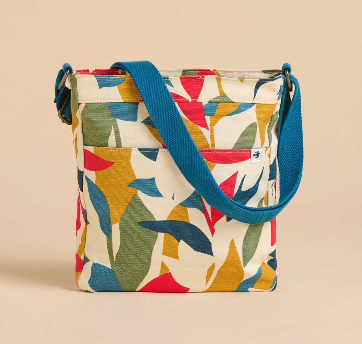 Brakeburn multicoloured cross body bag falling leaves pattern with adjustable blue strap