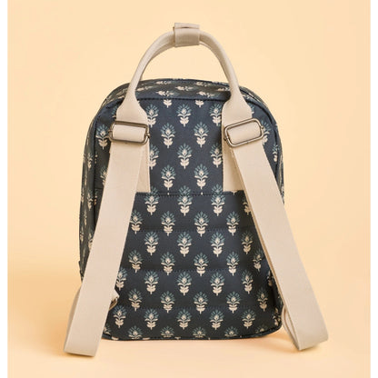 Brakeburn navy Henna floral patterned backpack with beige straps on a beige background