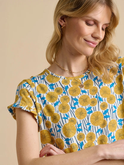 Brakeburn womens yellow t-shirt with floral print and short ruffle sleeves on model