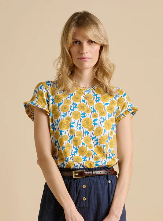 Brakeburn womens yellow t-shirt with floral print and ruffle sleeves worn by model