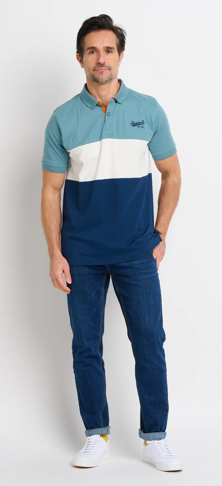 Men's short sleeve polo shirt from Brakeburn in a blue colour block style pattern.