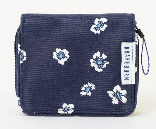 Brakeburn polka floral pattern purse in navy with white and blue flowers.
