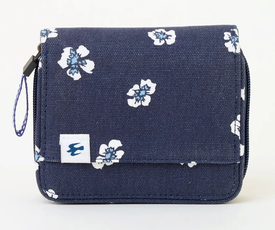 Floral pattern purse from Brakeburn in a navy canvas fabric with white and blue flowers.
