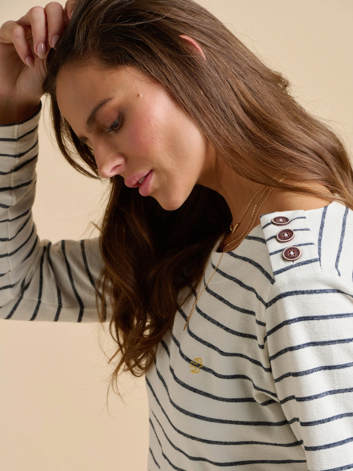 Women's Brakeburn white and navy long sleeve Bella Crew top with button shoulder detail.
