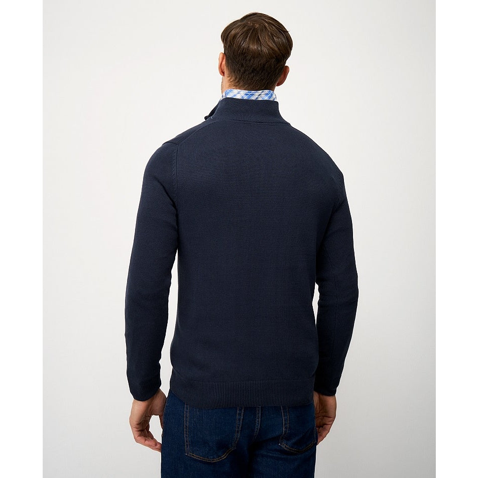Backt view of a man wearing a Crew Clothing 1/4 zip classic knitted jumper in Heritage Navy