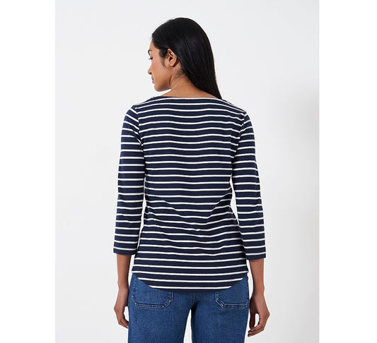 Back view of a woman wearing a Crew Clothing Essential Breton 3/4 sleeve t-shirt in navy with white stripes.