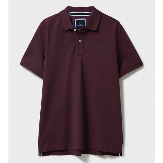 Front view of a mens Crew Clothing short sleeve classic pique polo shirt in Heritage Burgundy with small crossed oars logo on the chest