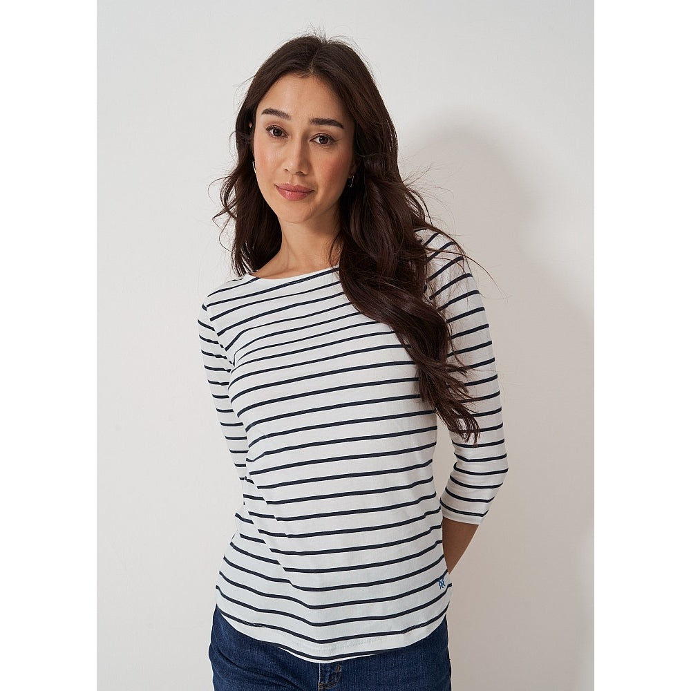 Front view of a woman wearing a Crew Clothing Essential Breton 3/4 sleeve t-shirt in white with navy stripes.