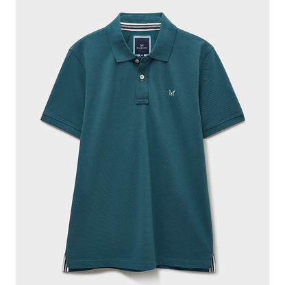 Front view of a mens Crew Clothing short sleeve classic pique polo shirt in Teal with small crossed oars logo on the chest