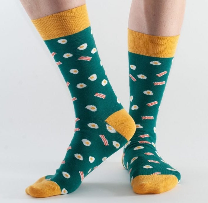 Doris & Dude women's bamboo socks in green with a bacon and egg pattern.