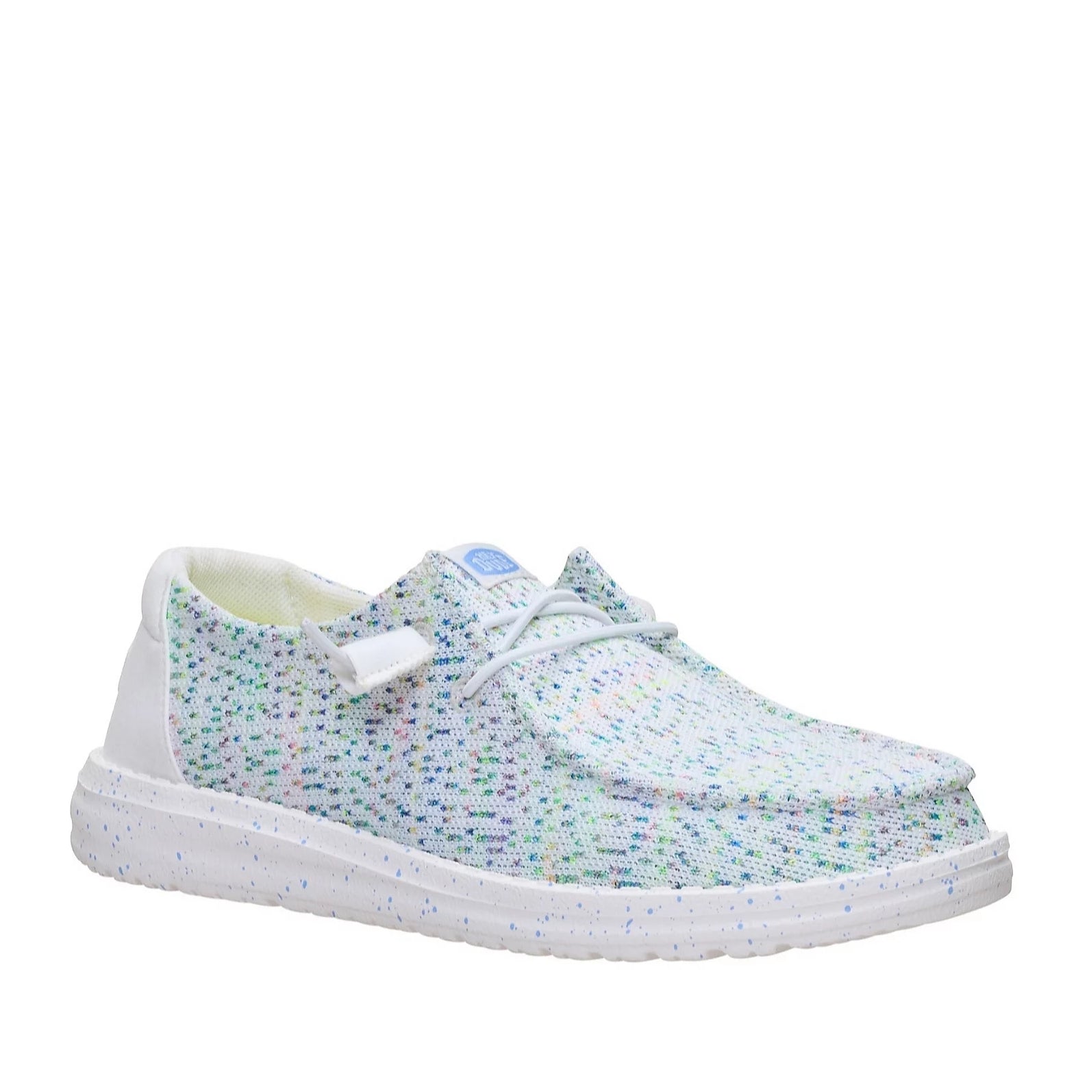 Main front view of a women's Dude Wendy Stretch Speckle shoe, featuring a white base covered in a dense multicolour speckle pattern of blue, green, and pink, with a solid white sole and white laces.